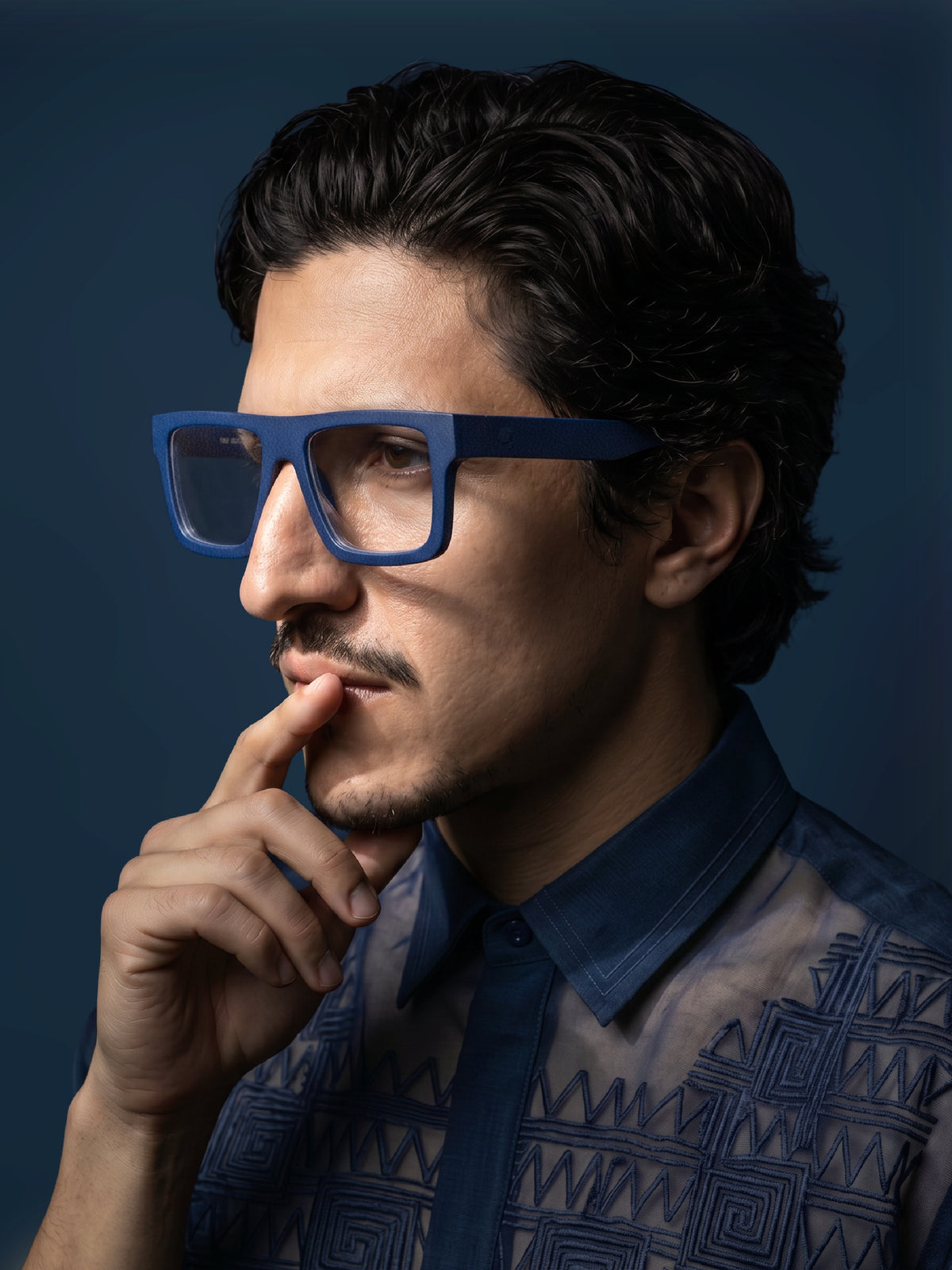 Side profile of Blynq Solo glasses in Indigo showing the temple arm